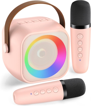 a pink mini karaoke machine with two microphones are good for christmas gifts