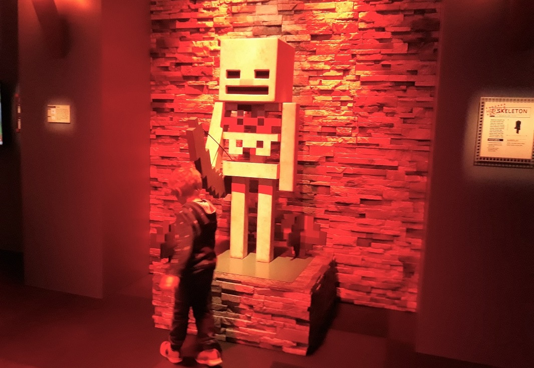 Minecraft-skeleton-Mopop-exhibit-boy-looking-museum-review