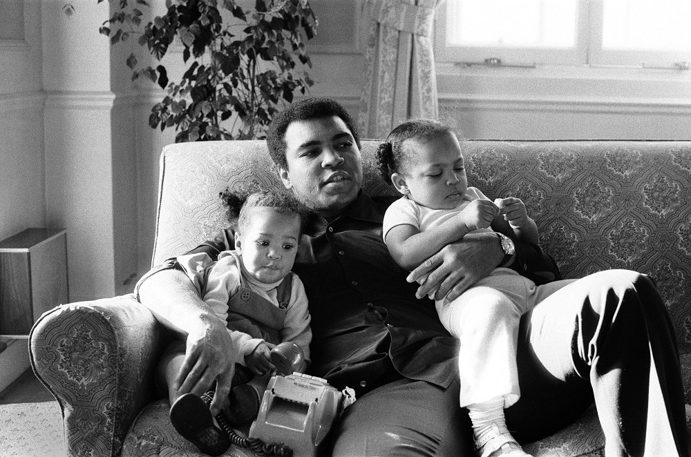 Muhammad-Ali-with-kids-1978-Men-of-Change-exhibit-Washington-State-History-Museum-credit-Ron-Harvey