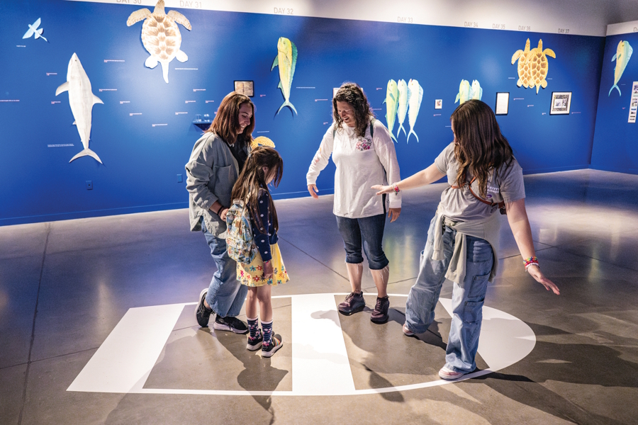 Family at an exhibit at the National Nordic Museum in Seattle