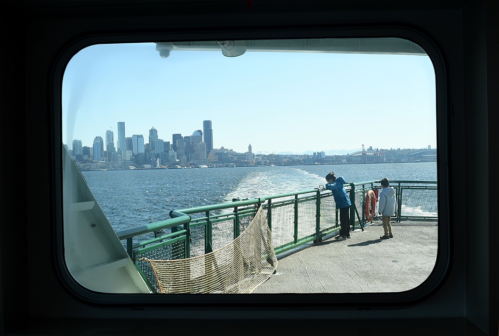 View through the ferry port hole on the MV Suquamish Bainbridge to Seattle ferry route