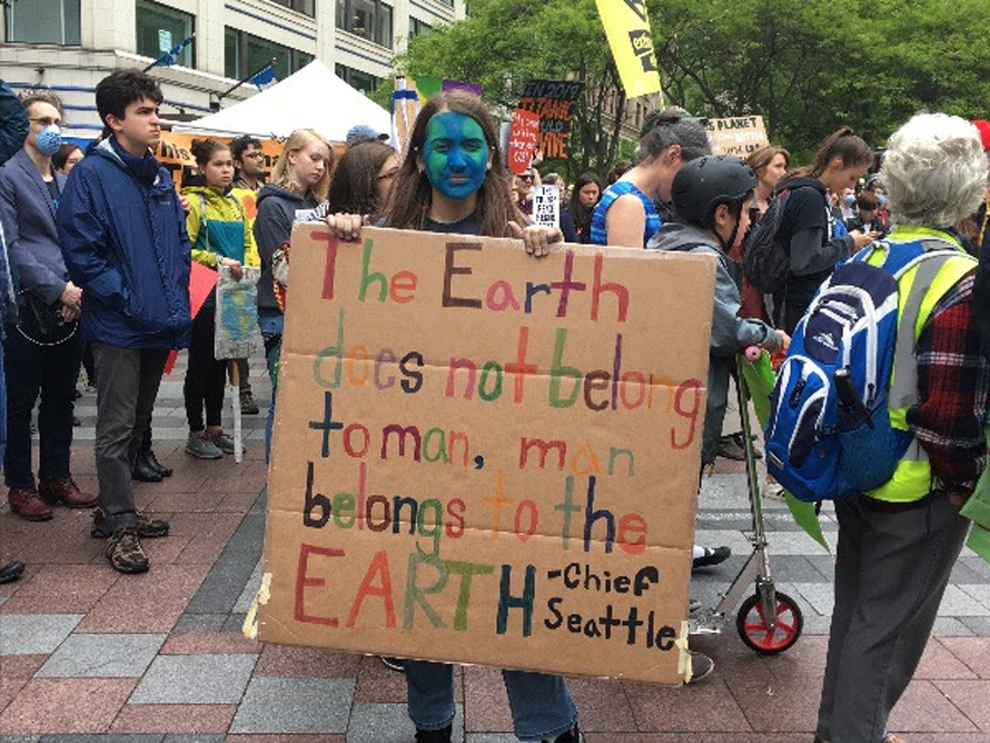 zoe holding a sign