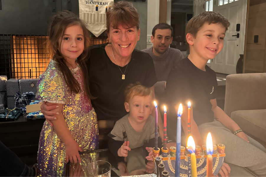 lighting hanukkah candles