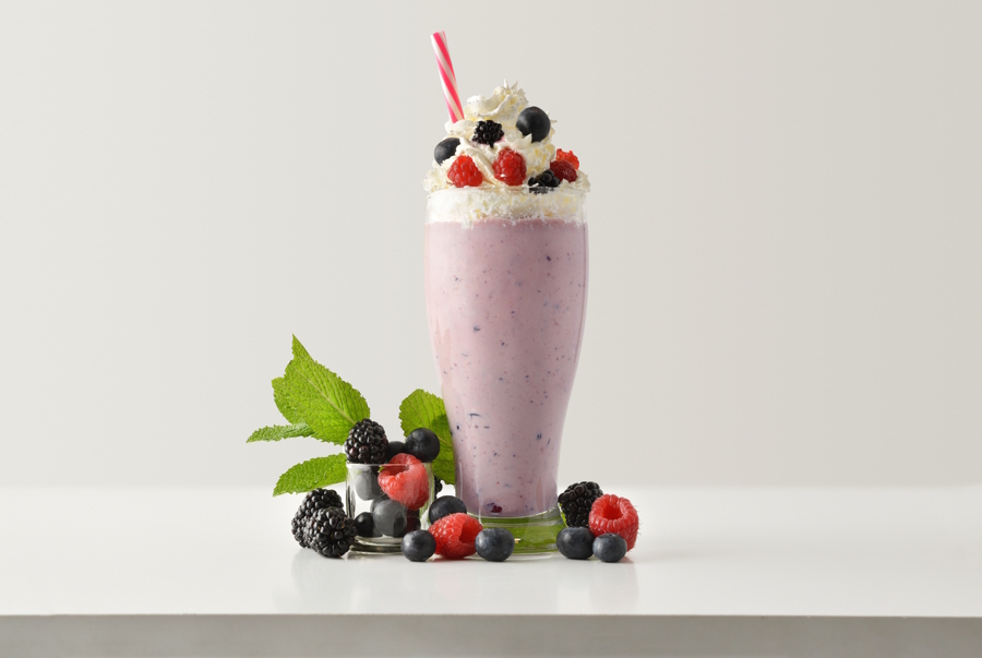 berry smoothie with berries on top