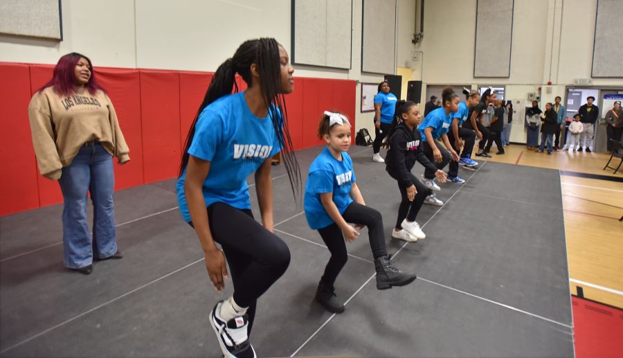 A girls dance group performs at Tacoma's Hilltop Carnival in Tacoma