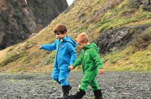 two boys wearing adventure suite