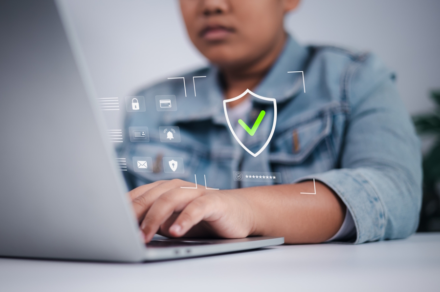 Childing using a laptop at school