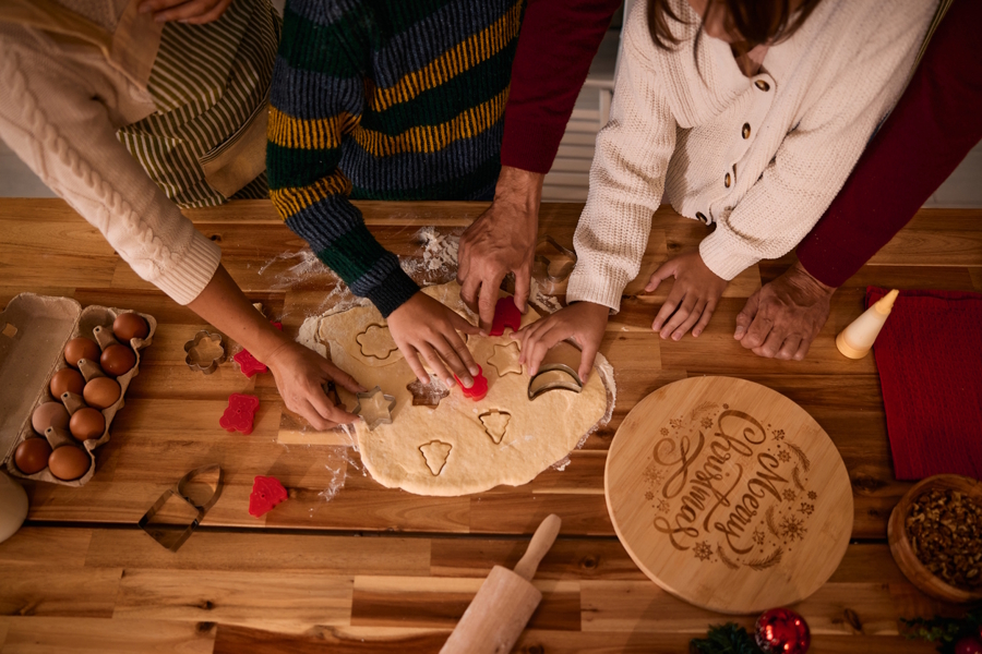 family making holiday cookies