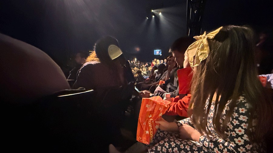 kids eating popcorn in their Cirque du Soleil Echo seats during the performance at Marymoor Park