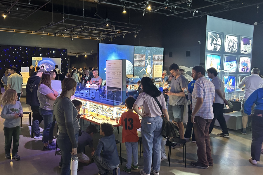 Families enjoying the Lego exhibit at PacSco