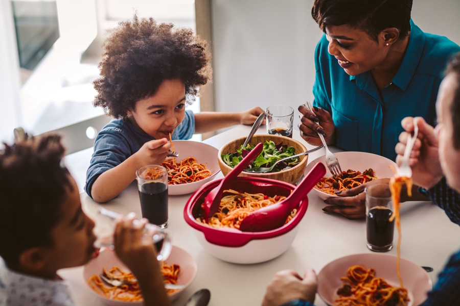 family eating dinner together at home