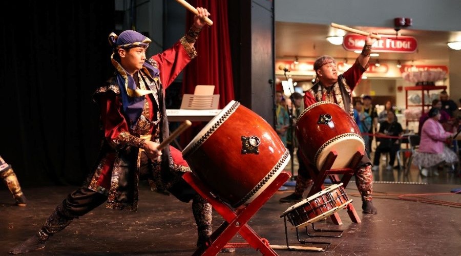 A young man drums on a Japanese taiko at the Seattle Center during the Cherry Blossom Festival.