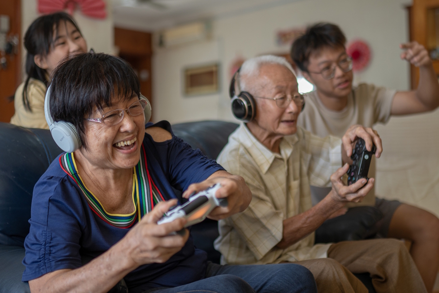 grandparents playing video games with kids