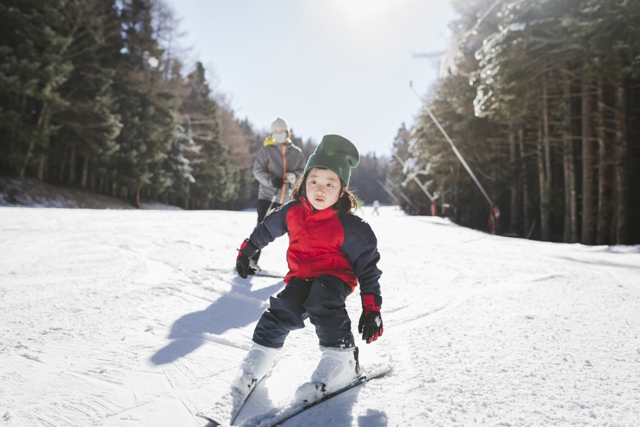 young child on skis