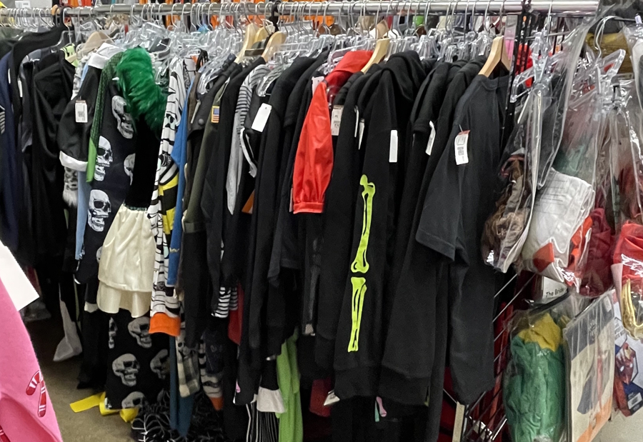 Row of Halloween costumes for sale at Goodwill