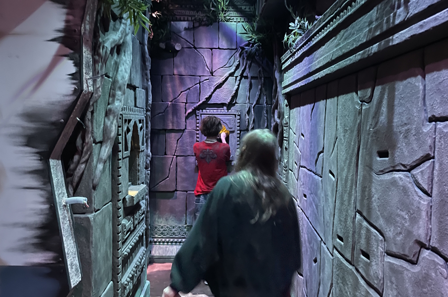 Walking into the second room of an escape room that looks like a ruin