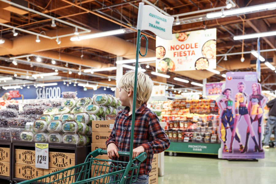 child with a small grocery cart at T&T