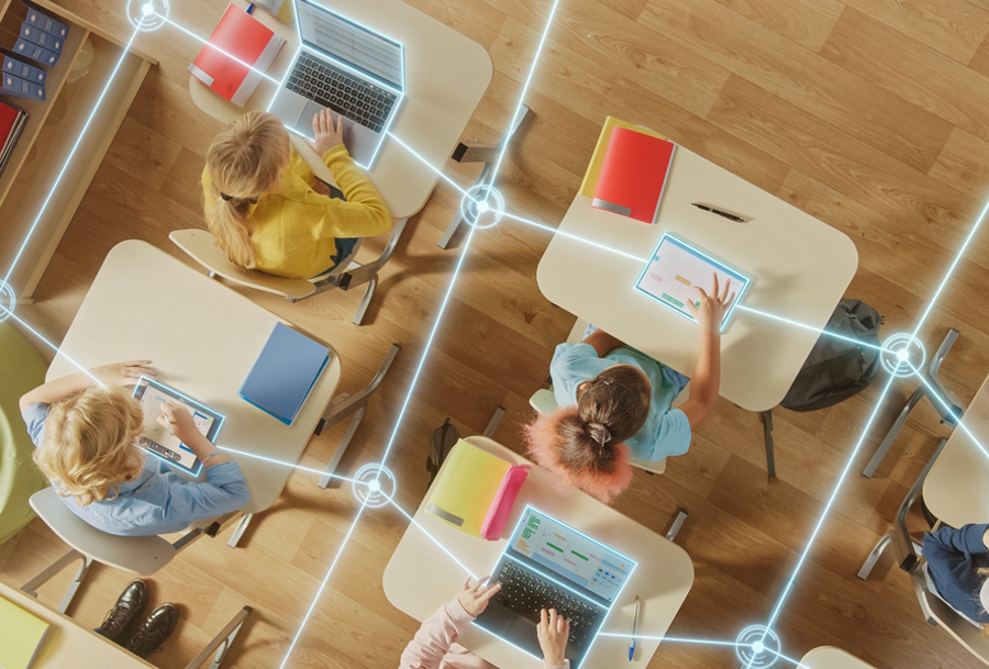 students using computers all connected