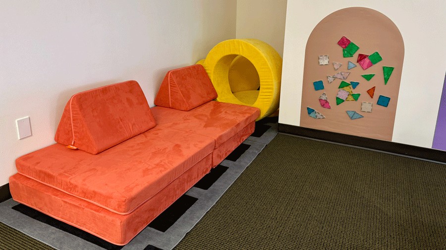 sensory-friendly corner with magnetic tiles and play couch at Laro Tayo