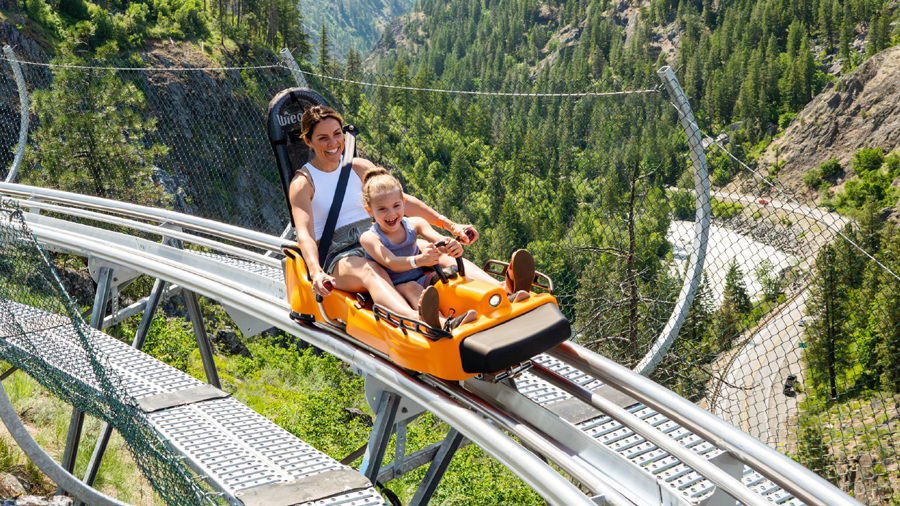 mom and daughter on alpine coaster at Leavenworth Adventure Park during a family vacation