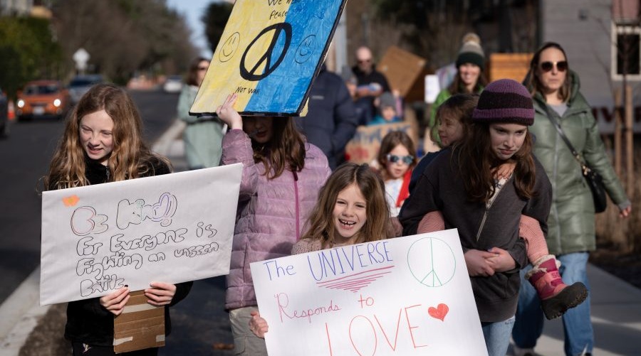 Kids and families march together on MLK Day in Bainbridge Island.