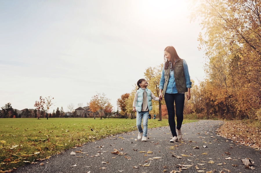Mom and child walking together