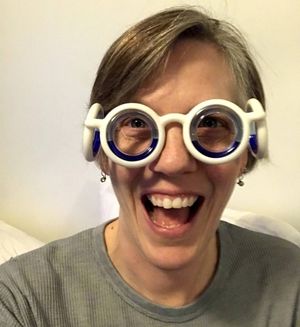 the author wearing motion sickness glasses