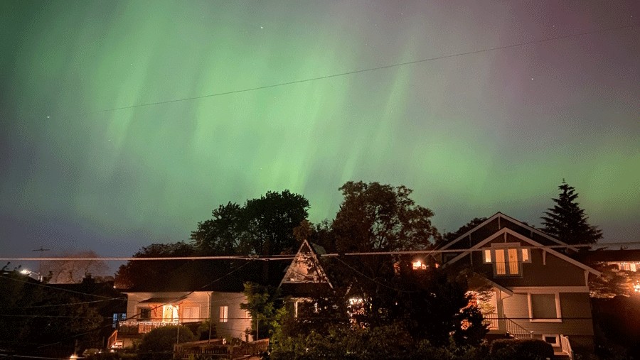 northern lights over a Seattle neighborhood