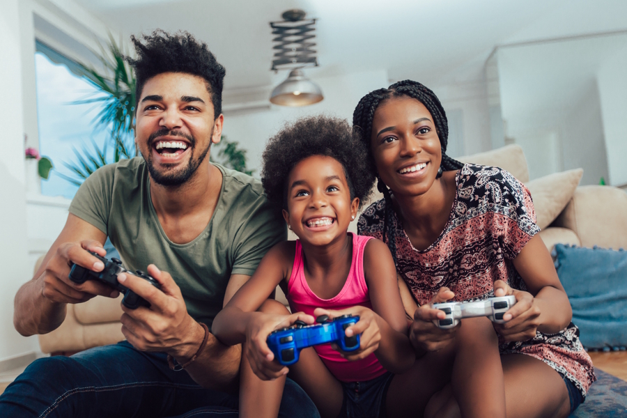 family playing video games together