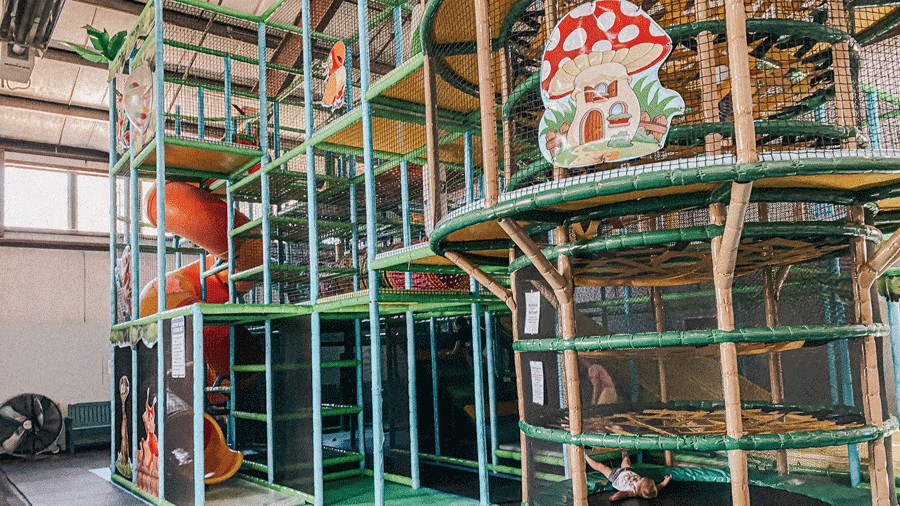 indoor playground with climbing structures and kids playing at Ahoy Kitsap in Bremerton, a fun place to take kids