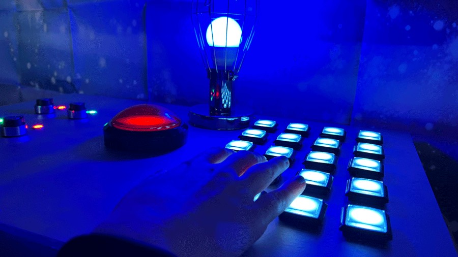 lit keys in an escape room at the new Maeve chocolate factory haunted escape room experience