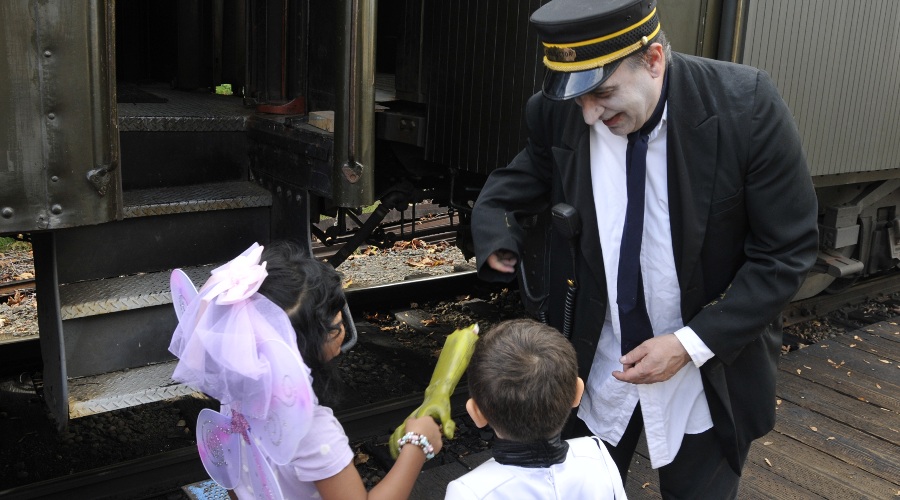 Kids in costume ready to board the Halloween train at NW Railway Museum.