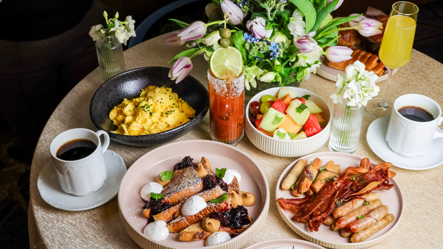 mother's day brunch spread with cocktails and sweet and savory dishes at Fairmont Olympic Hotel