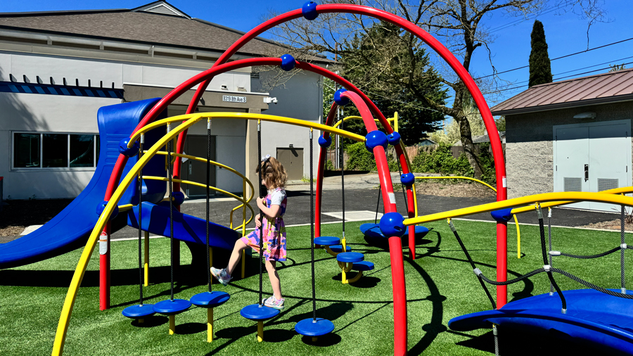 girl on playground area for younger kids at South Park