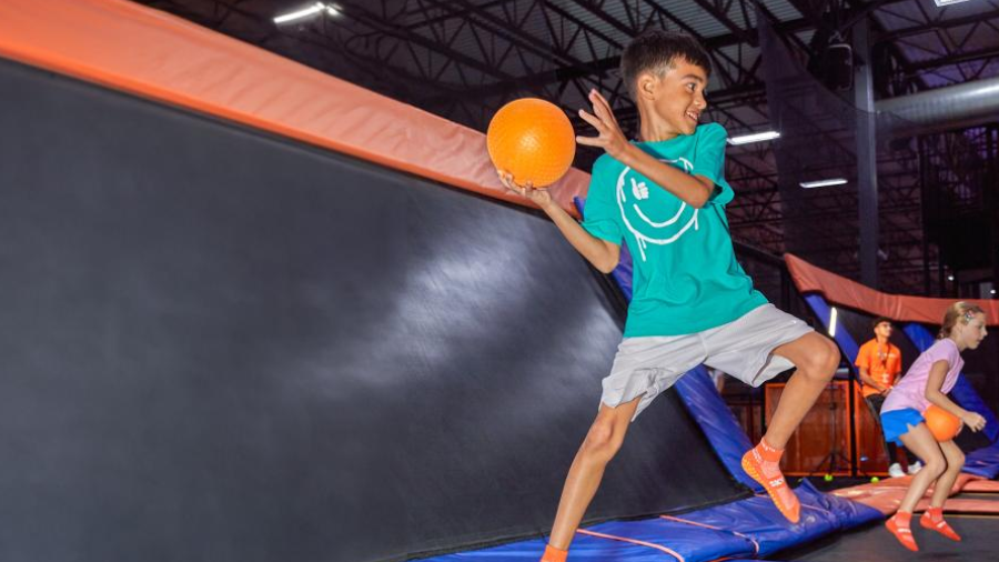 kid playing at sky zone