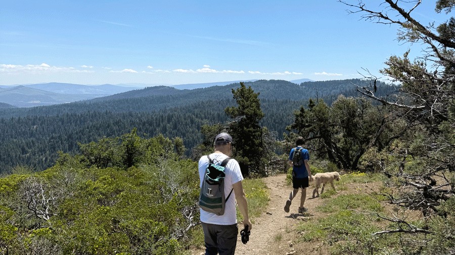 family hiking with their dog in Southern Oregon