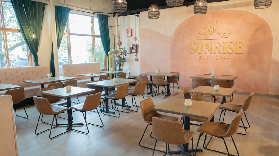 sunrise play cafe dining area with booths and tables for families