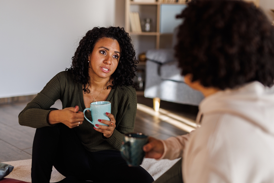 two woman having a conversation in a respectful way 
