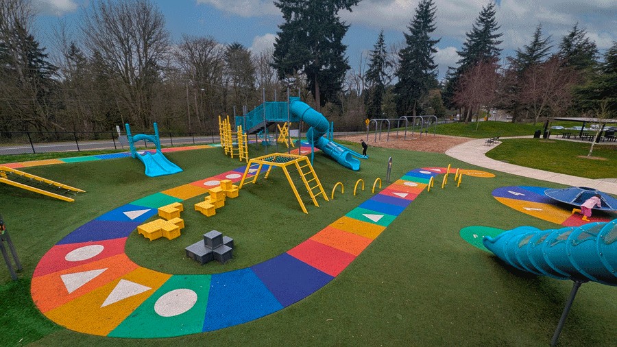 rainbow-colored path on the boardgame playground at West Fenwick Park