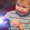 Boy-with-flashlight-fun-games-for-kids-to-play-in-the-dark