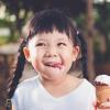 girl with ice cream cone lick lips tasty ice cream shops for seattle kid and families