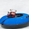 Boy-tubing-in-the-snow-best-places-for-sledding-and-tubing-around-Seattle