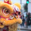 Close-up of yellow lion head during traditional Chinese lion dance lunar new year celebrations Seattle families 2021