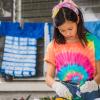 kid-making-tie-dye-t-shirts
