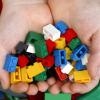 Kid-holding-Lego