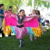 A young Native American girl dances during the Circle of Indigenous People celebration at a past Northwest Folklife Festival