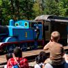 A life-size Thomas the Tank Engine pulls a train car at the Day Out With Thomas event near Seattle at the Northwest Railway Museum in Snoqualmie, Washington