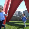 little boys running through the sculpture park by the Seattle waterfront