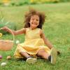 Smiling girl holding up her Easter basket best Easter events Seattle kids and families in 2022