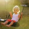 Young child swinging 